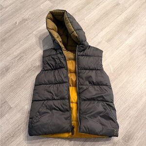 Kids Reversible Puffer Vest - Black and Yellow. Pockets available on both sides